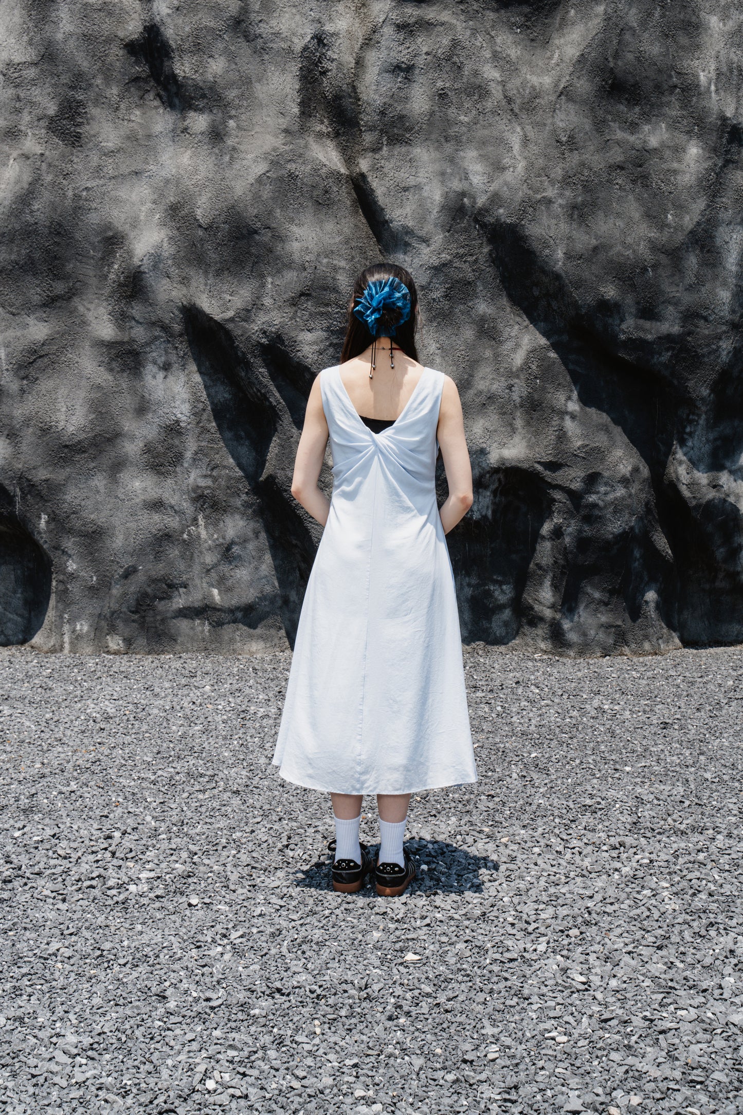 Blue Sleeveless Twist-Front Dress With Back Detail