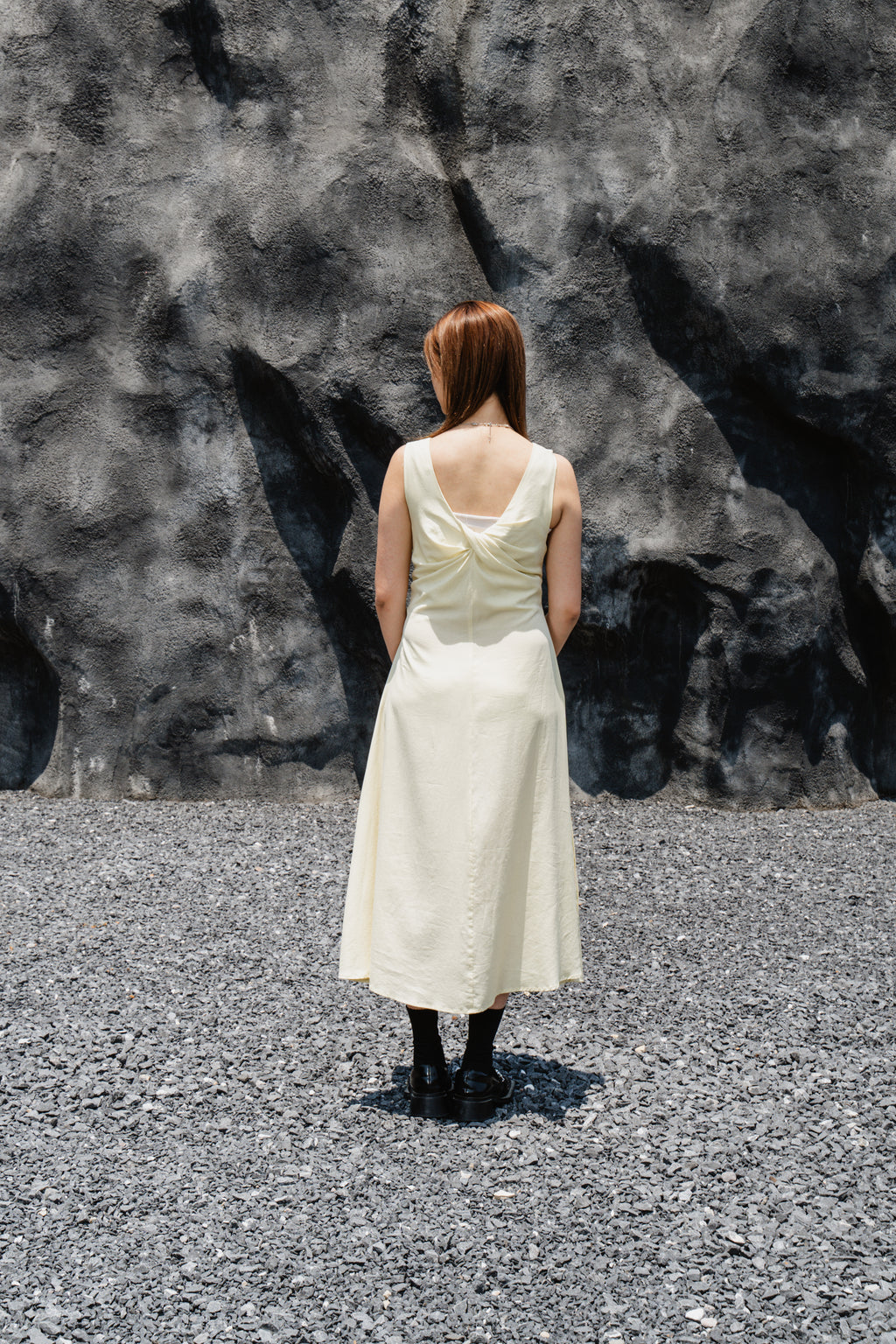 Yellow Sleeveless Twist-Front Dress With Back Detail
