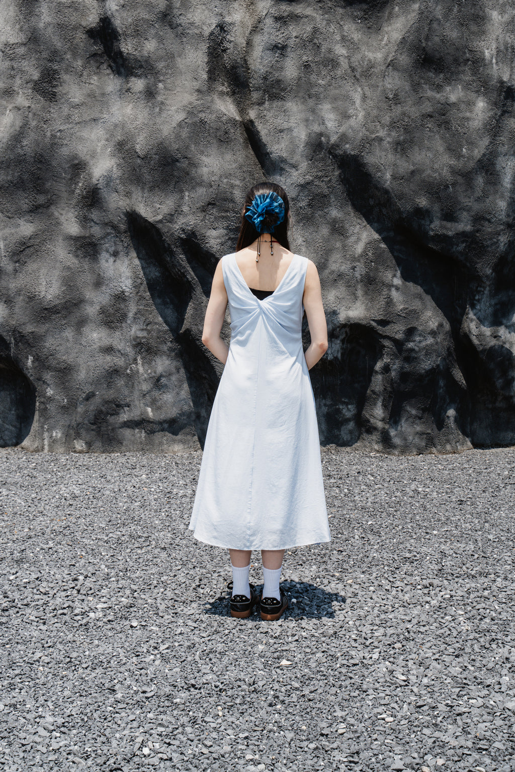 Blue Sleeveless Twist-Front Dress With Back Detail